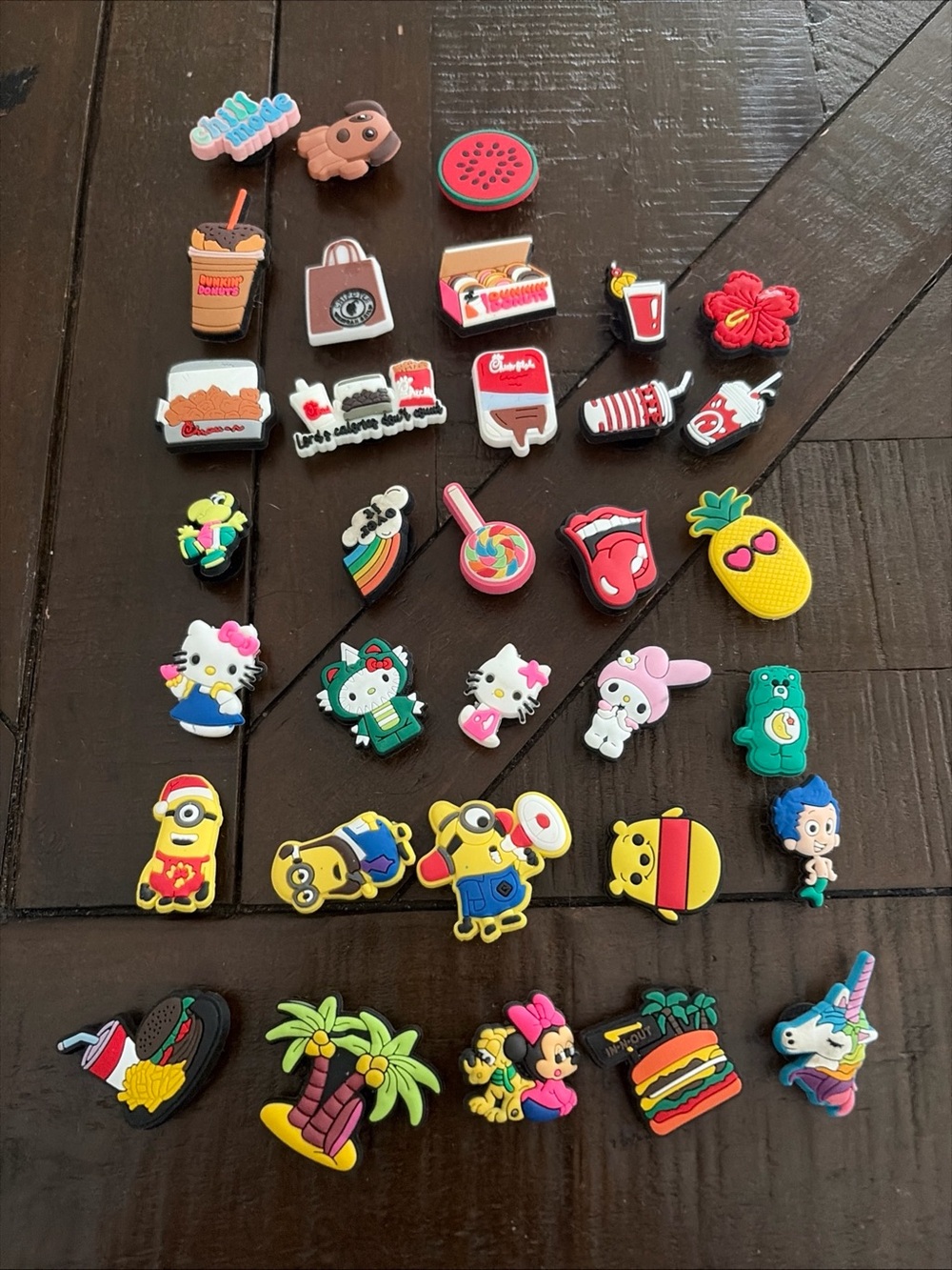 lot of 33 crocs jibbitz shoe charms assorted hello kitty chick fila minion